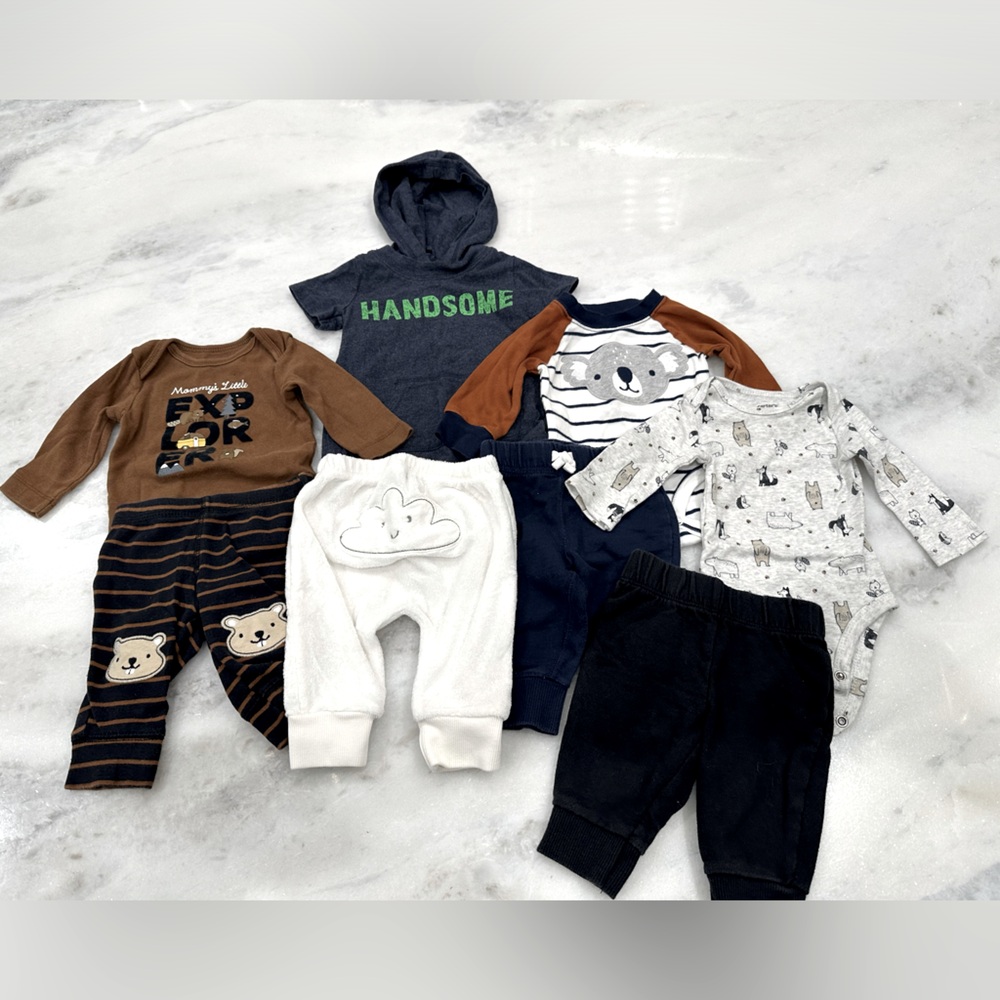 Size 3 months clothing bundle.3 long sleeve onesies, 4 pants, and hooded romper.